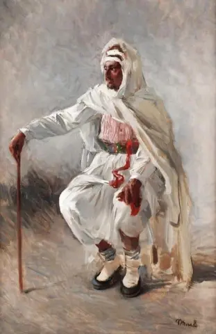 Sittande arab